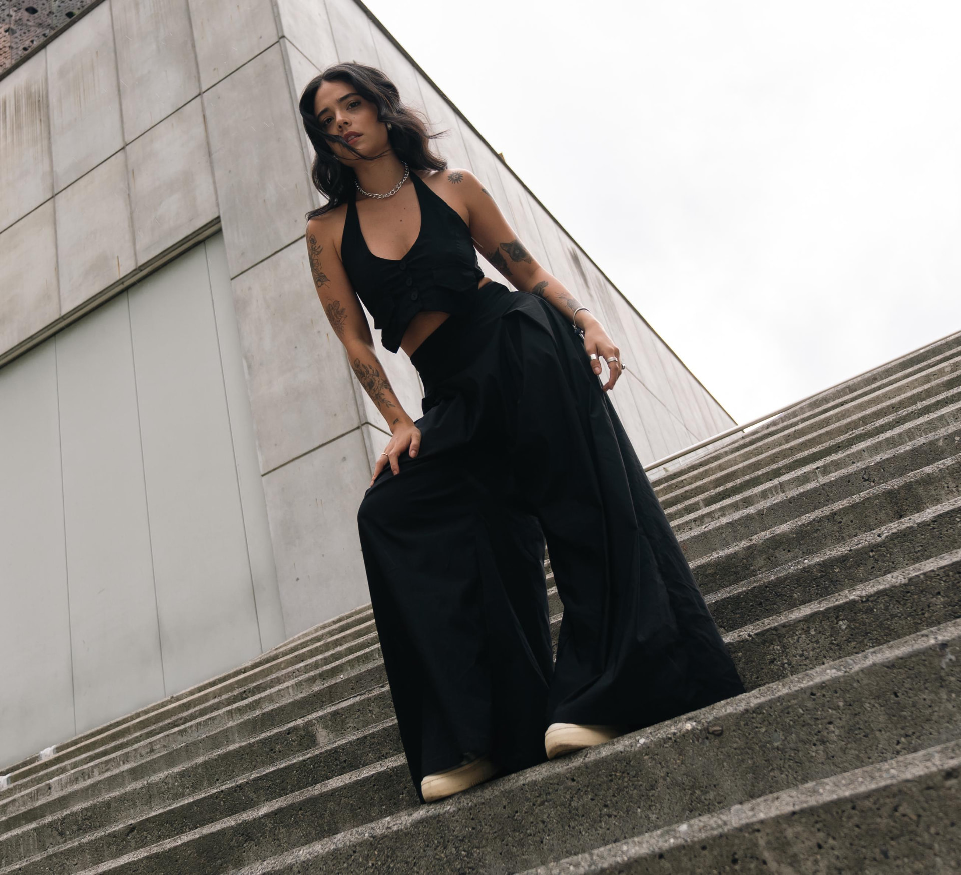Fashion Fusion — black halter top with wide-leg trousers